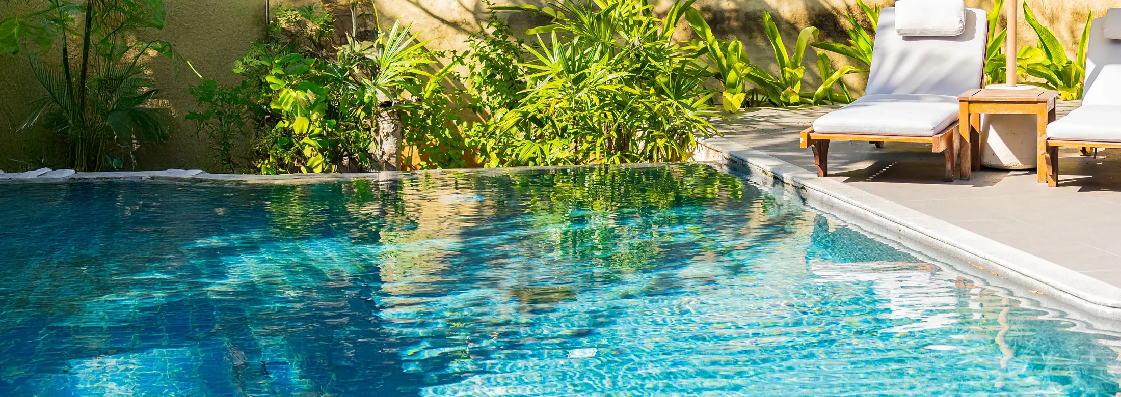 pool chairs next to nice pool